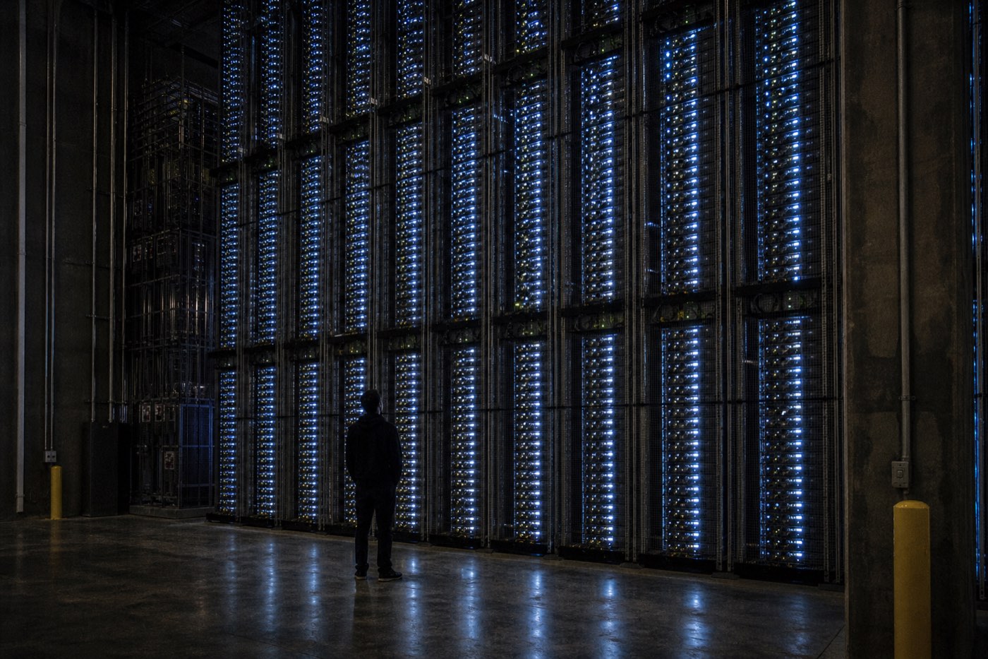 A cold, empty reading room, a single terminal glowing at the far end.